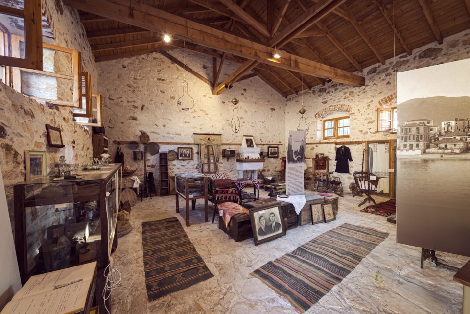 Inside the folklore museum with stone walls and traditional artifacts