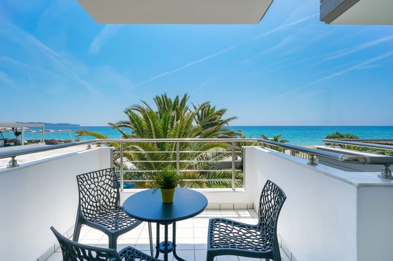 Balcony over the palms and the beach